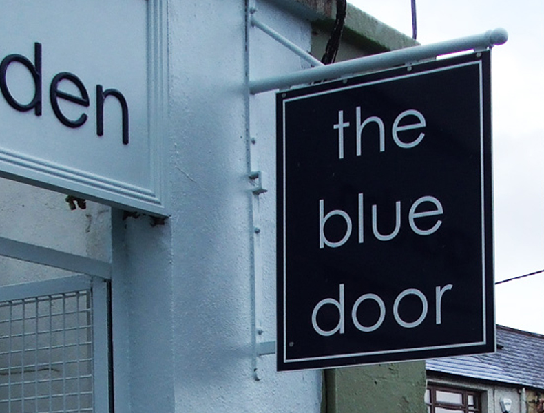 The Blue Door Outdoor Sign